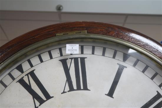 A Martin and Brown Brighton wall clock (original movement replaced with quartz movement) 91cm